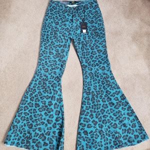 Turquoise, leopard/cheetah print bell bottoms jeans